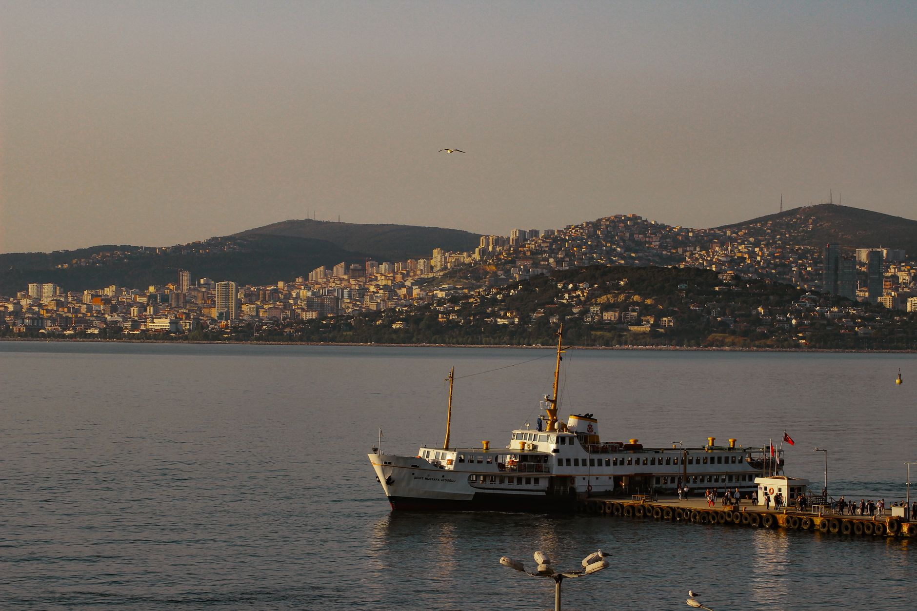 Panoramic view of the vibrant coastal shoreline and maritime ferry docks in Kadıköy.