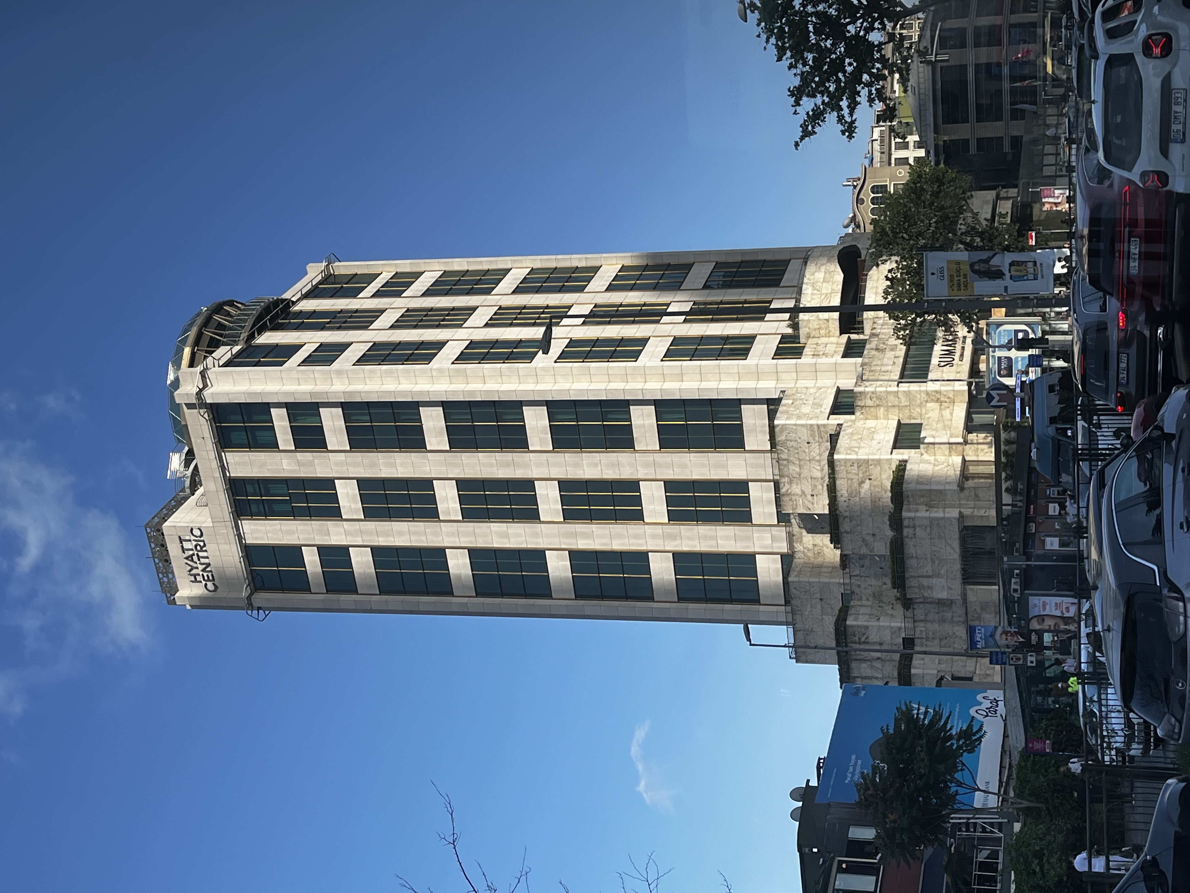 Contemporary glass boutique facade of Hyatt Centric Levent Istanbul along Büyükdere Caddesi.