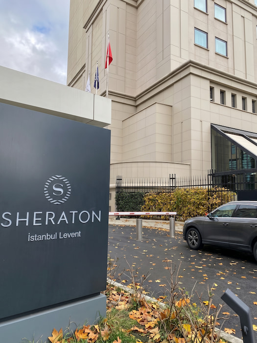 Official entrance, security gate and driveway of Sheraton Istanbul Levent hotel on Büyükdere Caddesi.